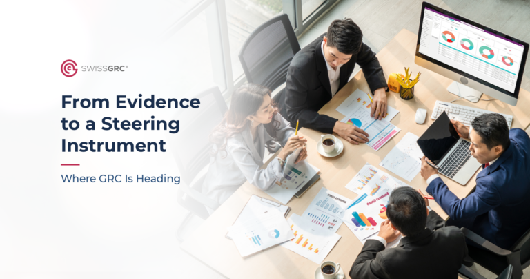 Swiss GRC experts collaboratively analysing risk data and charts to support GRC management.
